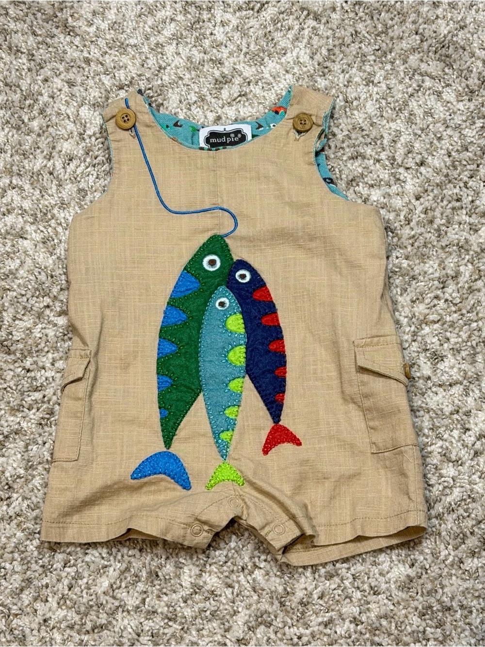 Mud Pie Tan Romper with Aqua and Multi-Colored Fish Accents